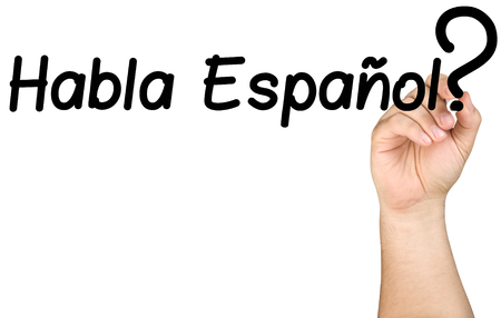 Hand Writing Habla Espanol on Clear Glass Whiteboardの写真素材