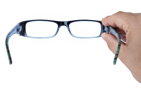 hand holding glasses or spectacles focusing isolatedの写真素材