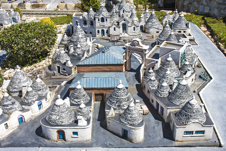 Rimini, Italy - Circa June 2015: Miniature of trulli of alberobello Italy Miniature playgroundの写真素材