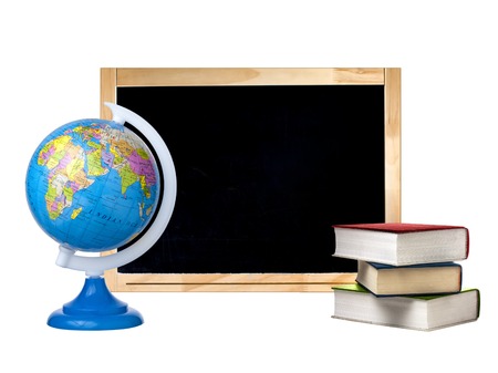 Blank blackboard globe and stack of books isolatedの写真素材