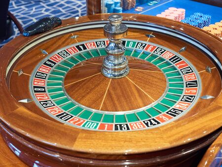 Roulette closeup in gambling casino on boardの写真素材