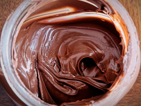 Topview closeup of chocolate hazelnuts cream canの写真素材