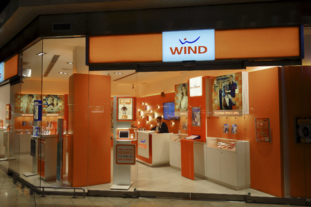 Milan, Italy - Oct 2016: Wind Multinational telecommunications company stand at central railway stationのeditorial素材