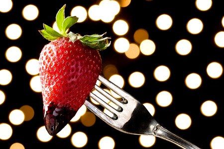 Romantic Chocolate Dipped Strawberry on a Forkの写真素材