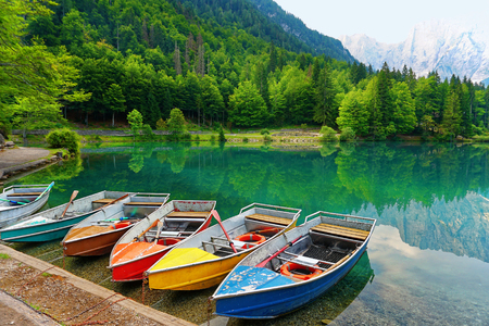 Colored Boats at lake of mountainの写真素材