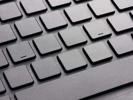 blank keys on computer keyboard close up without letters and signs