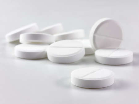 White pills or tablets close upの写真素材