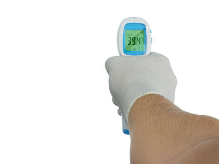 Closeup Hand holding Thermometer Gun gloves doctor Medical Digital Non-Contact Infrared Sight...