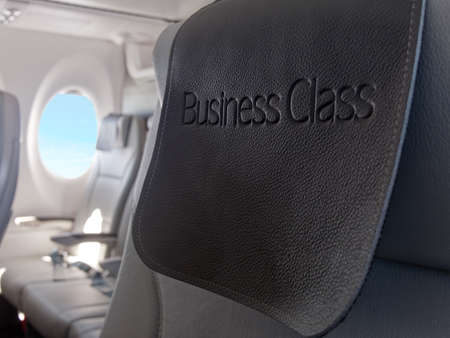 Business class seats on the airplane vacantの写真素材