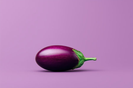 A vibrant eggplant resting on a soft purple background, showcasing its smooth texture and rich color. This image highlights the beauty of fresh vegetables, perfect for culinary or health-related themes. ai generated.の素材