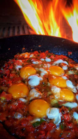 Shot of a risale-i nur and a coffee on a table at a house by the sea with beautiful sea on the background on a rainy day, Risale-i Nur is a book which explains some of the ayahs of Quran.のeditorial素材