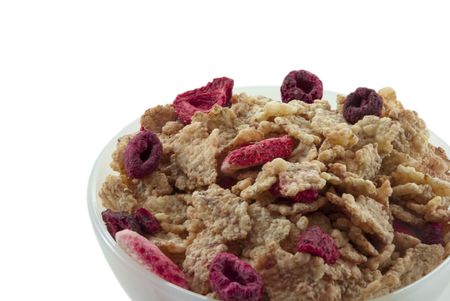 Bowl of corn flakes cereal with fresh  strawberries on whiteの写真素材