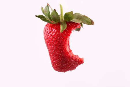 Strawberry with one biteの写真素材