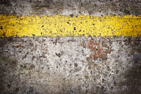 Grunge floor with yellow lineの写真素材