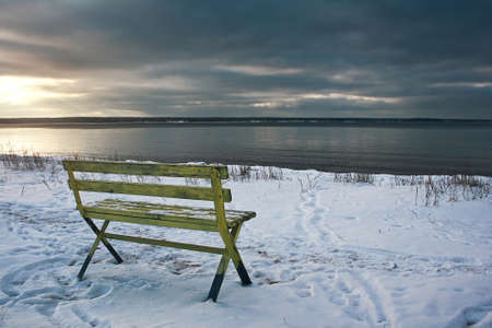 Empty bench at seasideの写真素材