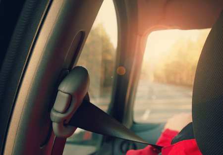 seatbelt in rear view to the windscreen and roadの写真素材