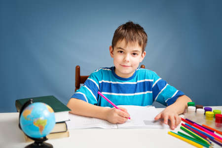 seven years old child reading a book