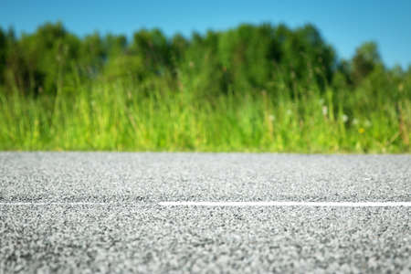 Asphalt road in beautiful spring dayの写真素材