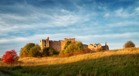 Old castle ruins in sunset lightの写真素材