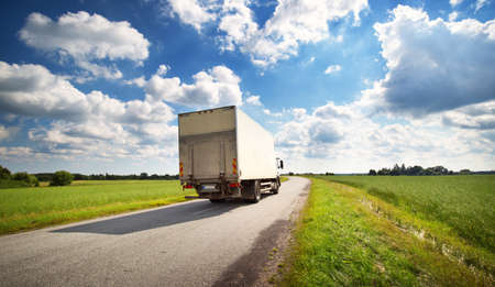 lorry moving on sunny eveningの写真素材