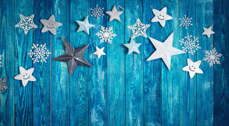 Christmas stars on wooden planksの写真素材