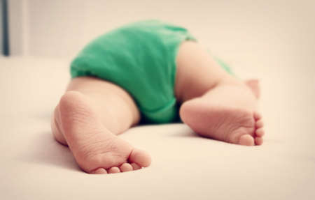 Baby feet on white backgroundの写真素材