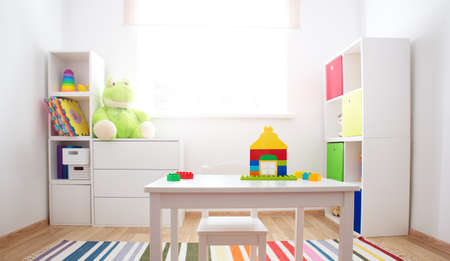 Colourful children rooom with white walls and furnitureの写真素材