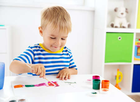 Little child drawing on the paperの写真素材