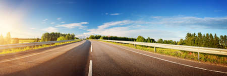 Road panorama on sunny spring evening
