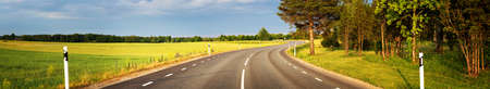 Road panorama on sunny spring eveningの写真素材