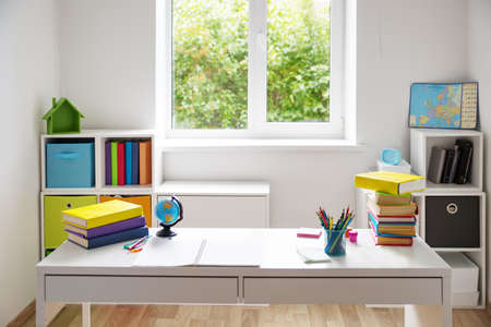 Colourful children rooom with white walls and furnitureの写真素材