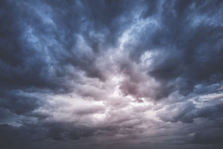 Dramatic clouds in late evening in summerの写真素材