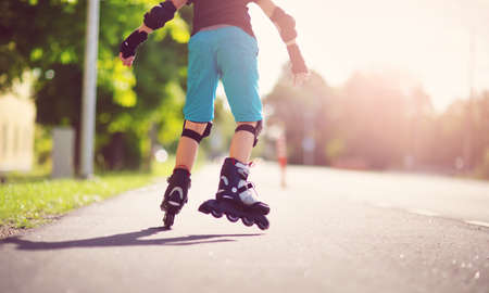 child on roller Skates in the eveningの写真素材