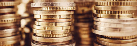 texture with stacked coins background, money savingsの写真素材
