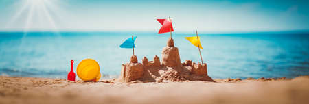 Sandcastle on the sea in summertimeの写真素材