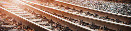 Railway track in the evening in sunsetの写真素材