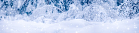 Snowy background with closeup view of the wavy snowdrifts in snowfall.の写真素材