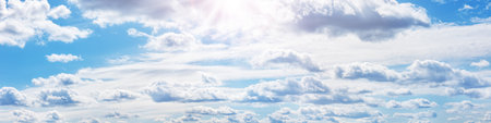 Blue sky with soft white clouds in sunny day