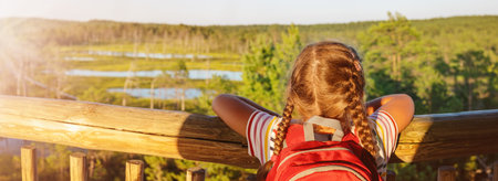 Girl standing on the observation tower on the Viru bog.の写真素材