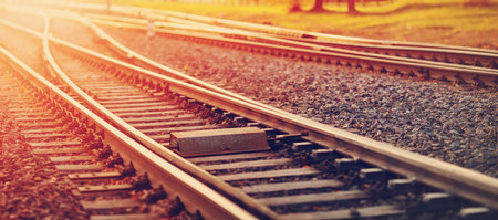 View of the crossing railway in sunset in summer.
