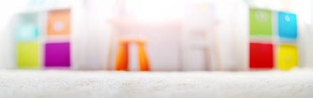 Blurred background of the colourful child room.の写真素材