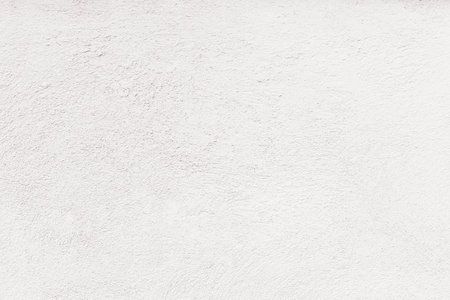 Empty concrete wall covering by white plaster.の写真素材