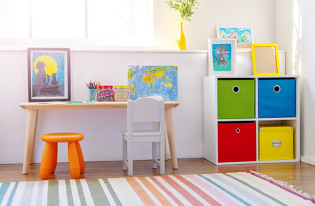 Comfortable room with colourful furniture in sunny day.の写真素材