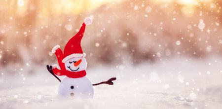 Little handmade snowman on the white snow on blue background.の写真素材
