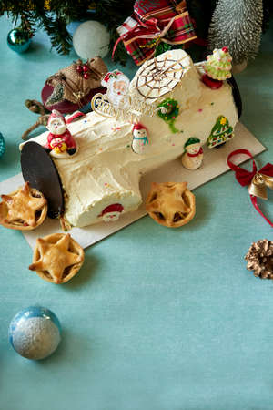 Christmas cake on blue backgroundの写真素材