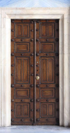 Antique side door of the metropolitan orthodox church in Athens, Greece