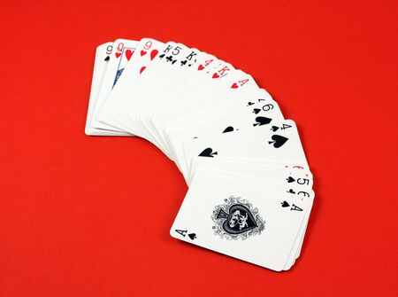 Playing cards on red deckのeditorial素材