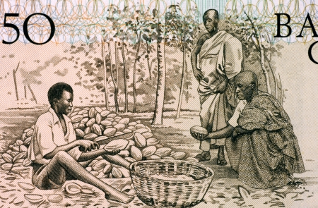 Men Splitting Cacao Pots on 50 Cedis 1980 Banknote from Ghana の写真素材