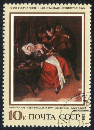 USSR - CIRCA 1973: A stamp printed in the USSR shows painting "Patient and the doctor" by artist Ja Haviksz Stee, stamp from collection Hermitage, circa 1973.のeditorial素材
