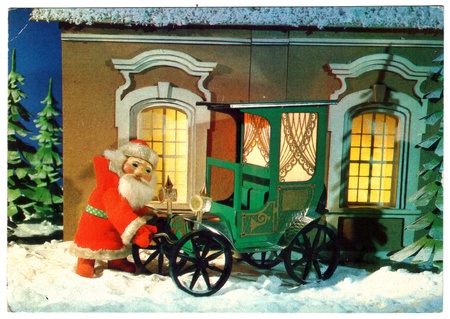 USSR - CIRCA 1990: Postcard printed in the USSR shows draw by Pokladova - Santa Claus is about the machine, circa 1990のeditorial素材